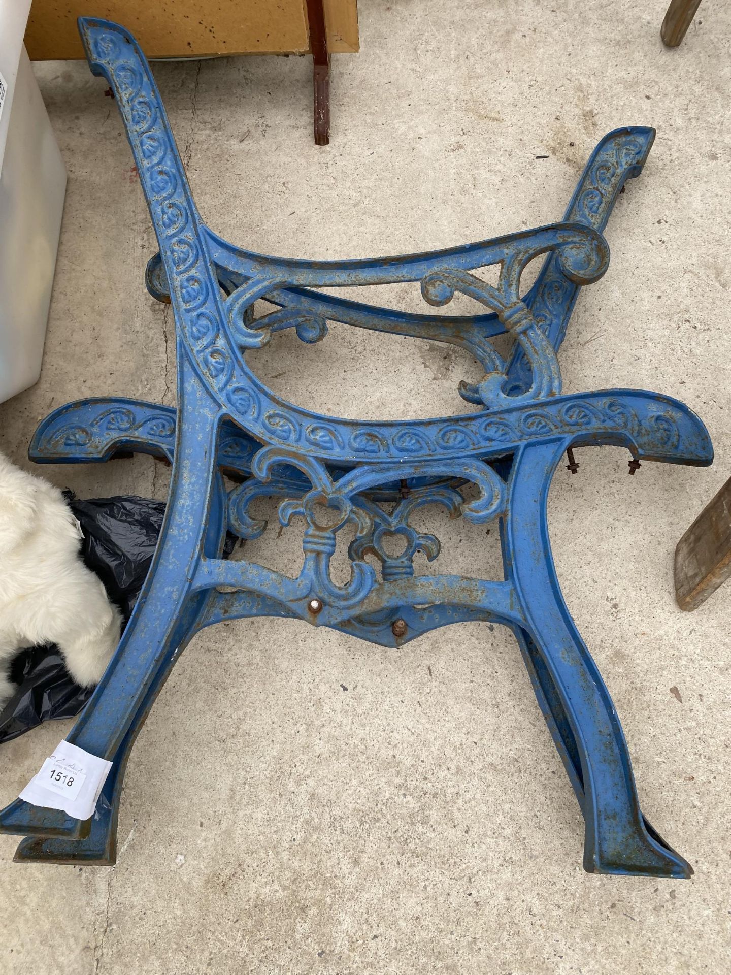 A PAIR OF CAST IRON BENCH ENDS