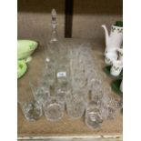 A LARGE COLLECTION OF ASSORTED CUT GLASS TO INCLUDE DECANTER