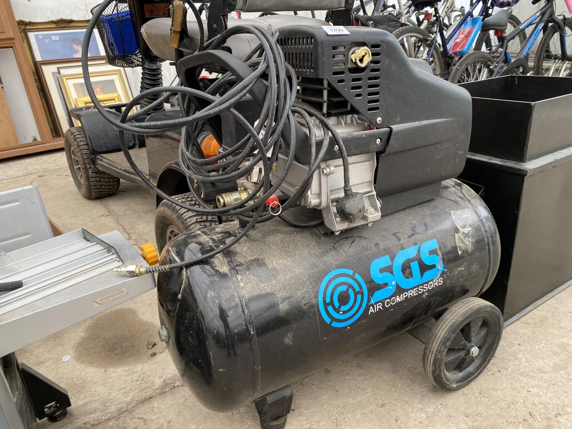 AN SGS AIR COMPRESSOR BELIEVED IN WORKING ORDER BUT NO WARRANTY