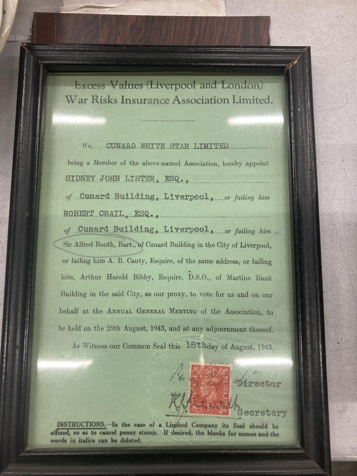 A CUNARD WHITE STAR 1943 FRAMED INSURANCE DOCUMENT