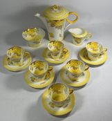 A SHELLEY ART DECO 'PHLOX' PATTERN TEA SET COMPRISING TEAPOT, SUGAR BOWL, CREAM JUG AND SIX CUPS AND