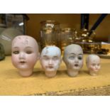 FOUR VINTAGE BISQUE DOLLS HEADS TO INCLUDE ONE MARKED GERMANY WITH THE NUMBER 395 A.100 M, A CEUS,