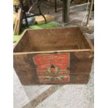 A VINTAGE BOX WITH A PHOTO ENLARGING GLUE LABEL