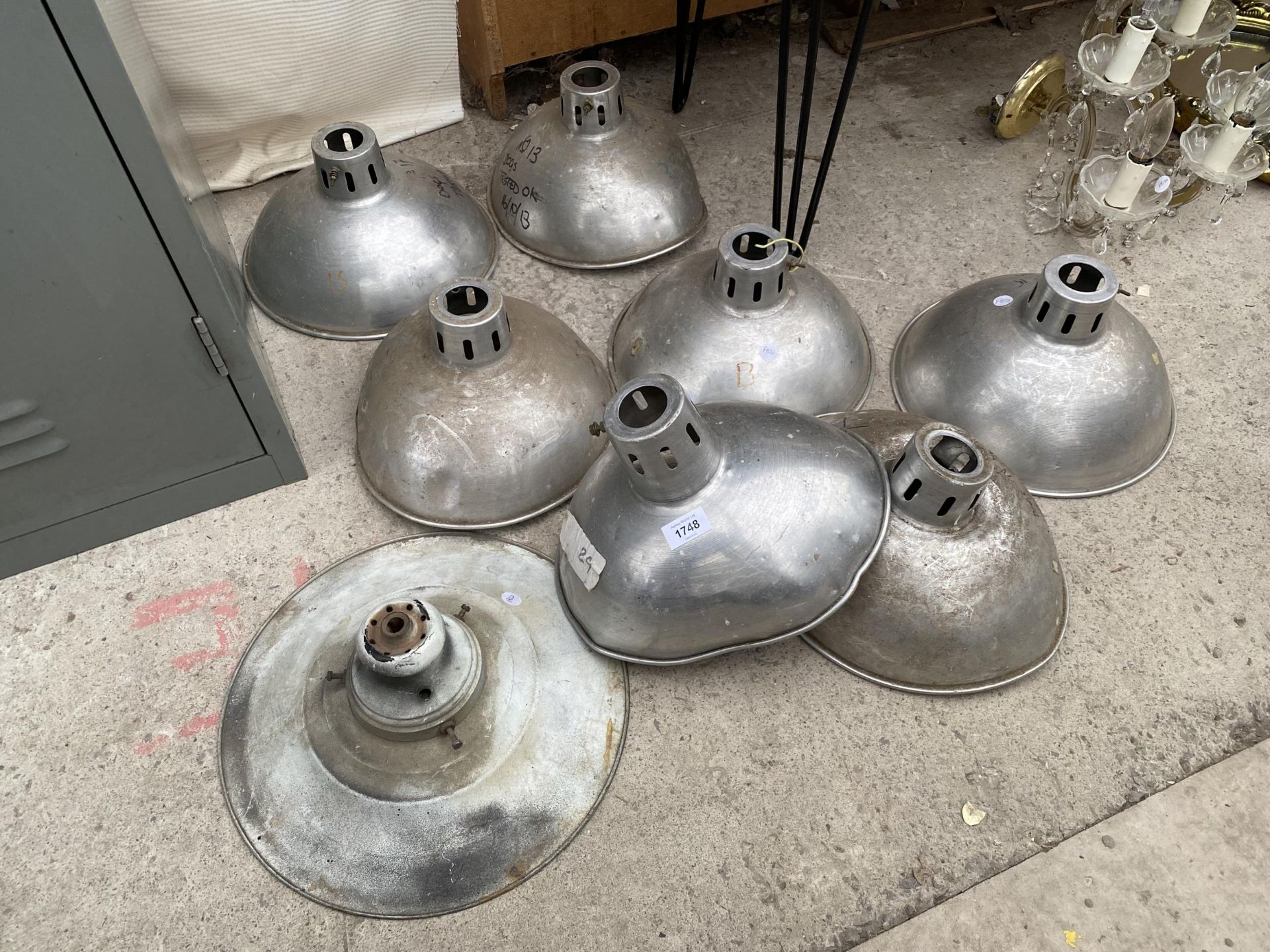 AN ASSORTMENT OF INDUSTRIAL STYLE STAINLESS STEEL LIGHT SHADES