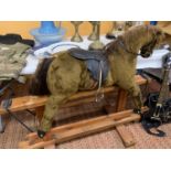 A VINTAGE 'PEGASUS' TOYS ROCKING HORSE HEIGHT TO SADDLE 89CM LENGTH APPROX 124CM