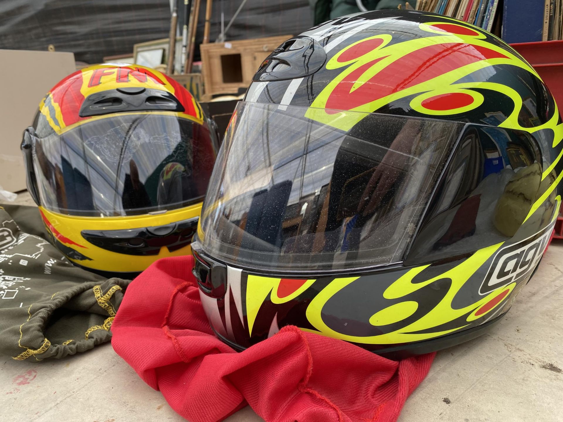 AN AGV MOTORBIKE HELMET AND A FURTHER FM MOTORBIKE HELMET - Image 2 of 2