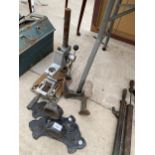 A DRILL STAND, A COBBLERS LAST AND TWO GUTTER BRACKETS ETC