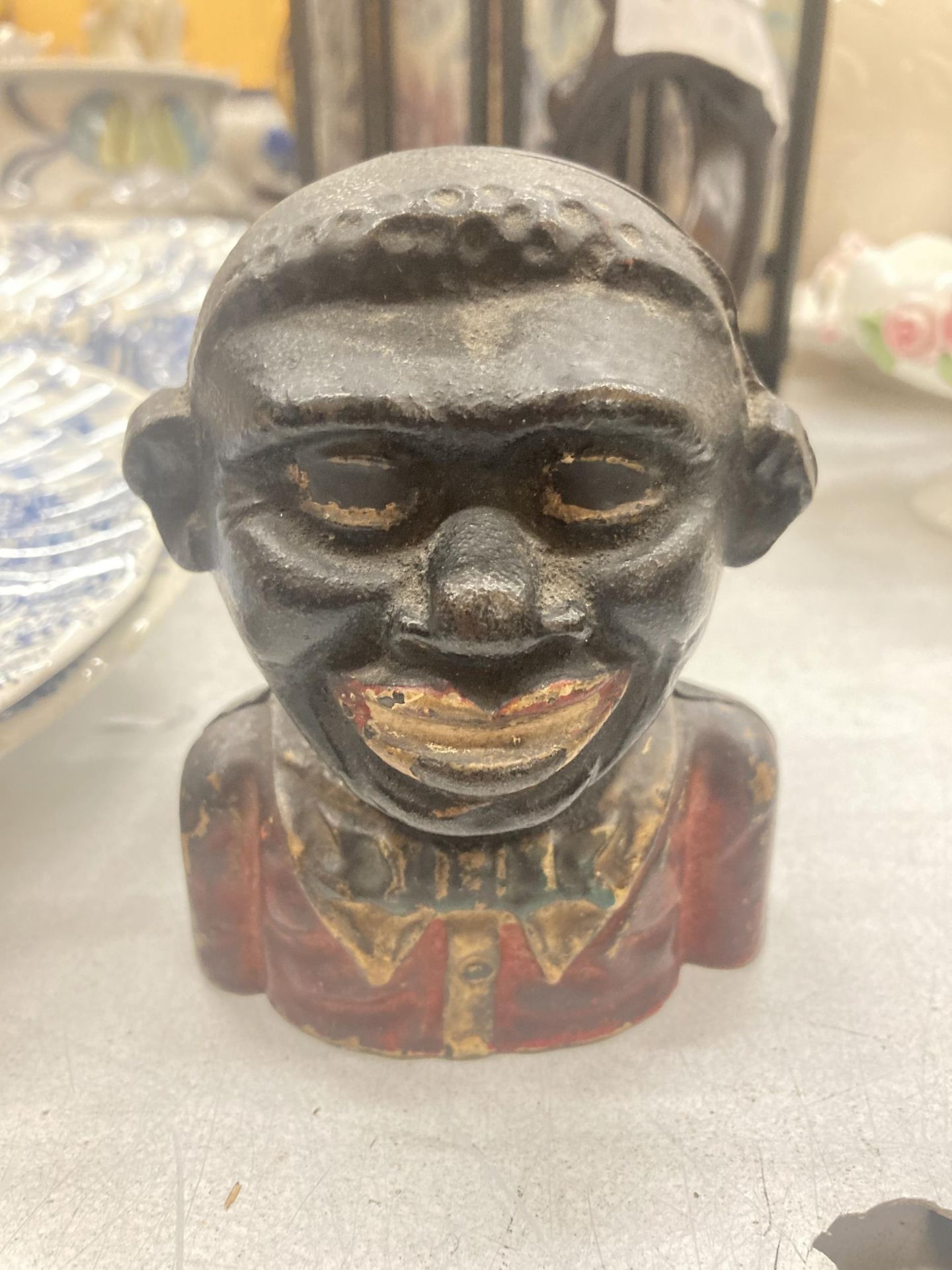 A 'JOLLY BOY' MONEY BOX