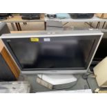 A PANASONIC 26" TELEVISION WITH REMOTE CONTROL