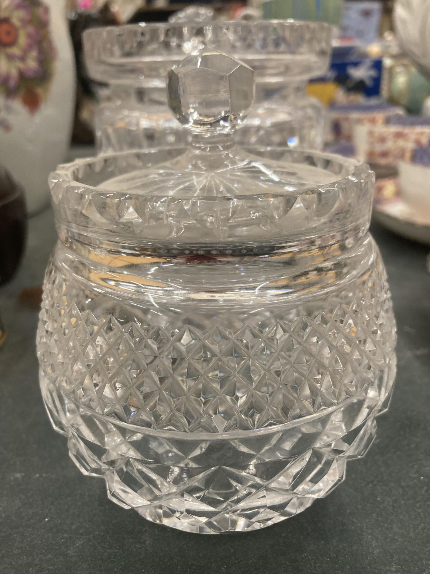 A GLASS FOOTED CAKE STAND, PLUS THREE STORAGE JARS - Image 3 of 4