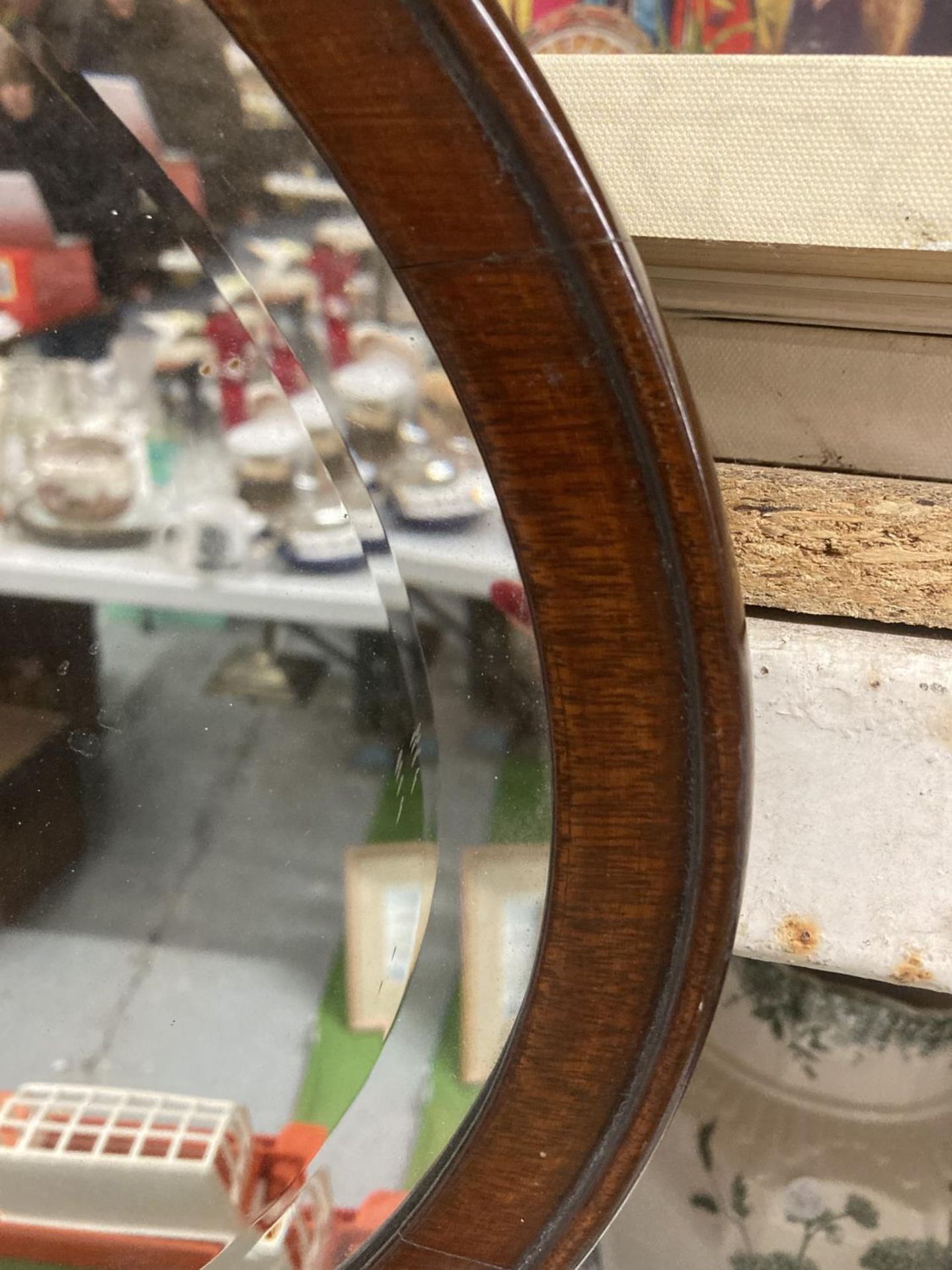 A MAHOGANY FRAMED OVAL MIRROR - Image 2 of 2