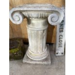 A LARGE RECONSTITUTED STONE PLANT PEDESTAL IN THE FORM OF A GREEK STYLE COLUMN (H:75CM)