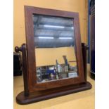 A MAHOGANY FRAMED DRESSING TABLE MIRROR