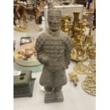 A STONEWARE TERRACOTTA STYLE WARRIOR FIGURE - HEAD A/F - HEIGHT 28CM