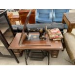 A SINGER TREADLE SEWING MACHINE (NO.51961) AND A QUANTITY OF PATTERN PAMPHLETS