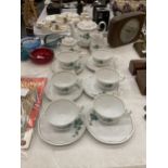 A FIESTA TEASET TO INCLUDE A TEAPOT, SUGAR BOWL, CREAM JUG, SIX CUPS AND SAUCERS