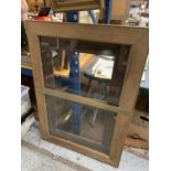 A LARGE OAK PICTURE FRAME 83CM X 117.5CM