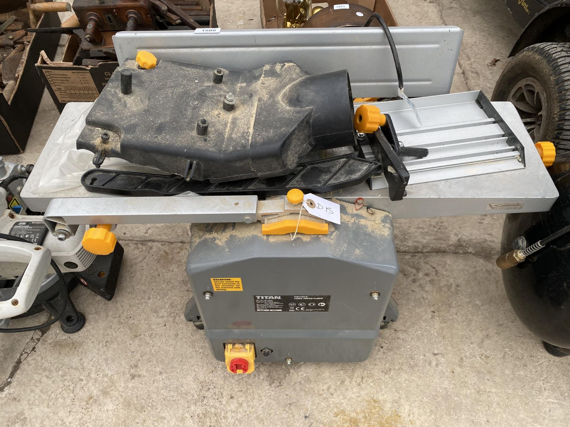 A TITAN JOINTER PLANER BELIEVED IN WORKING ORDER BUT NO WARRANTY