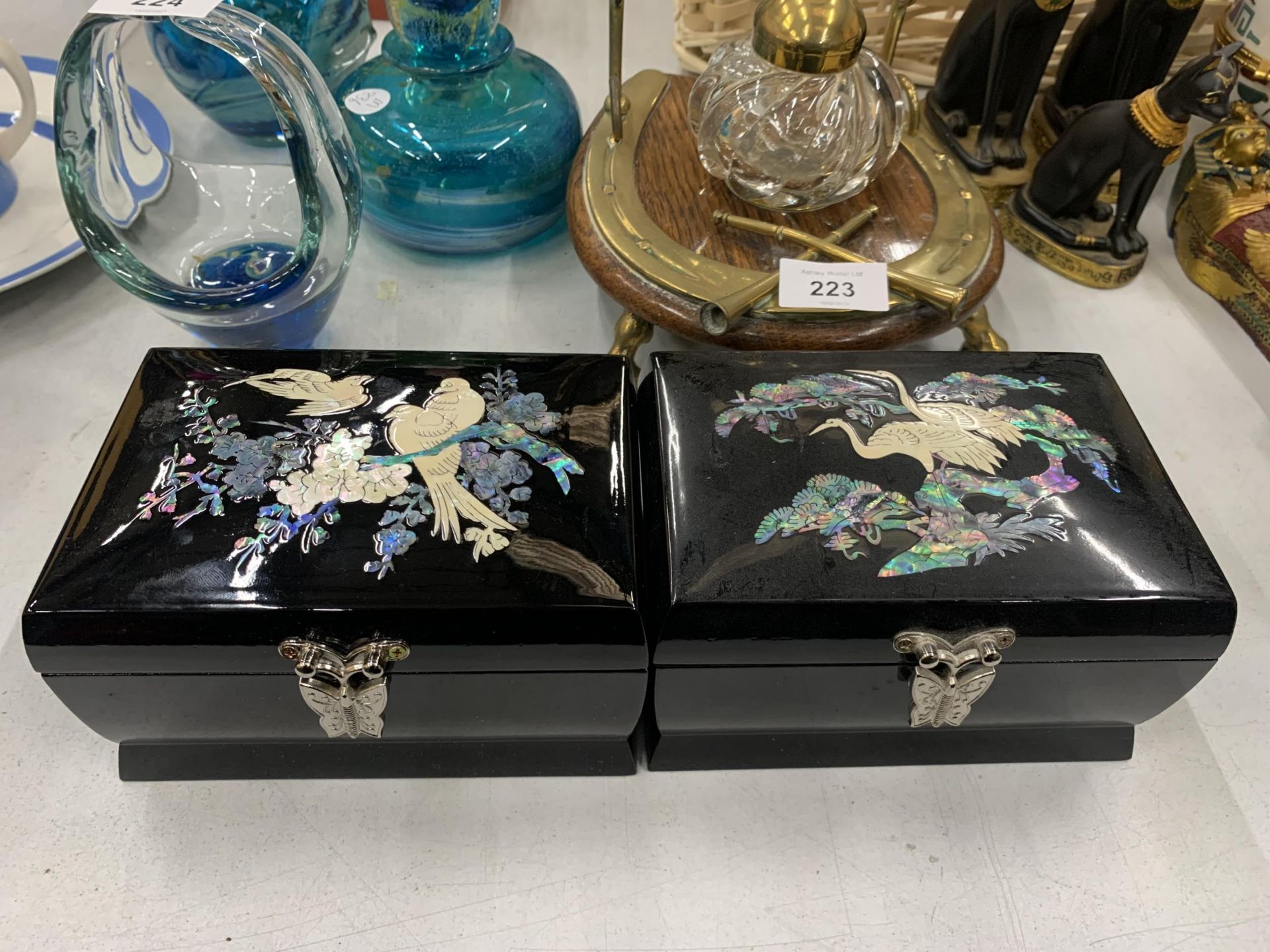 TWO LACQUERED MUSICAL BOXES WITH MOTHER OF PEARL DECORATION