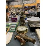 A QUANTITY OF BRASS ITEMS TO INCLUDE A MINERS LAMP, AN OIL LAMP, BAROMETER AND CANON