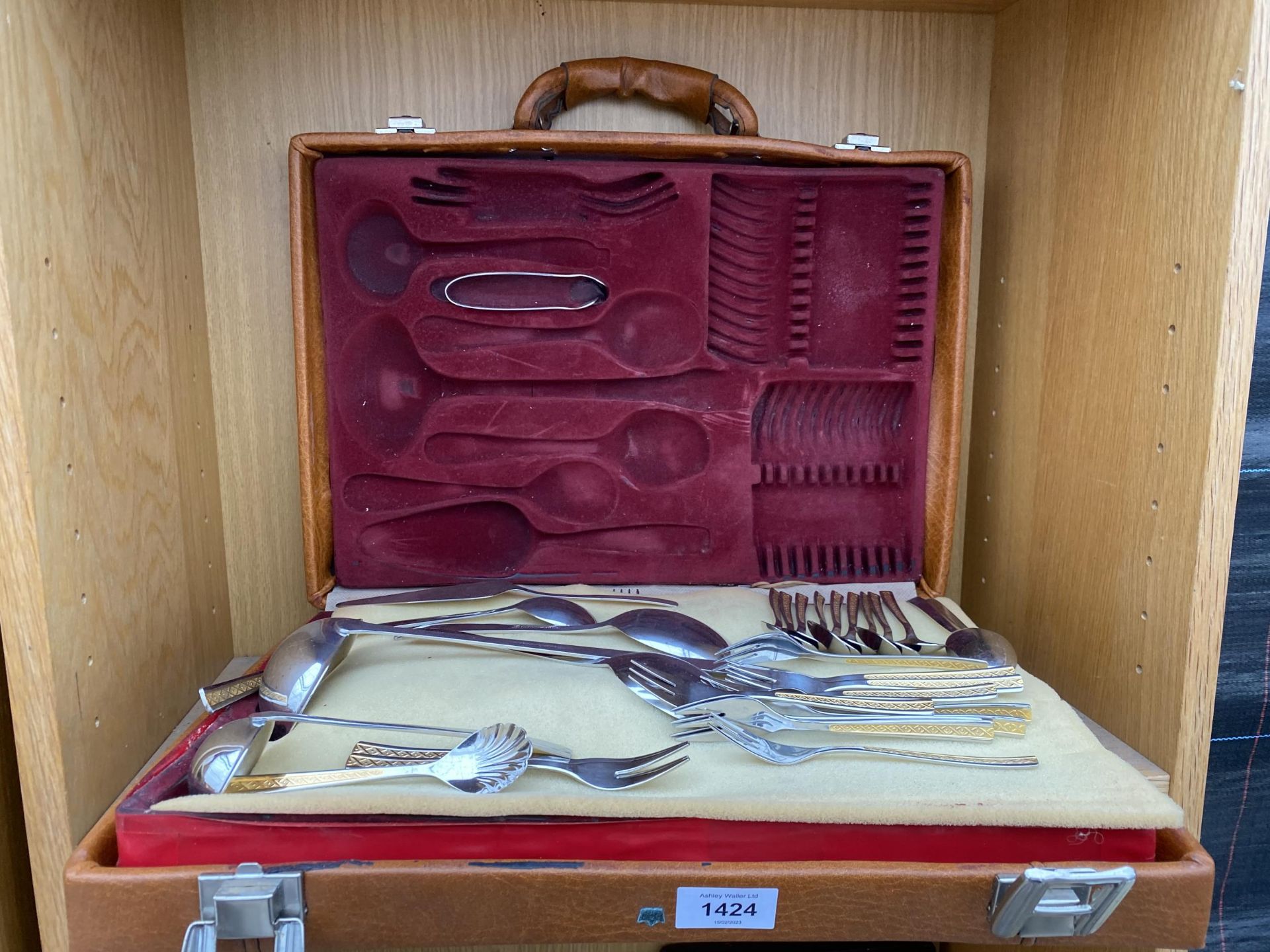 A PART COMPLETE LEATHER CASED CANTEEN OF CUTLERY