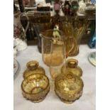 SEVEN PIECES OF AMBER GLASSWARE TO INCLUDE VASES, JUGS, CANDLESTICKS ETC