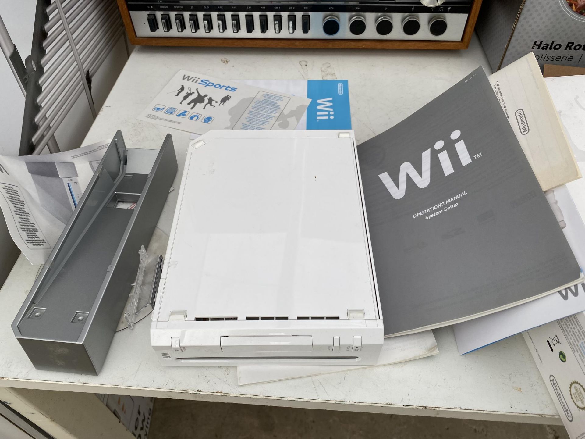 A NINTENDO WII AND A WII FIT BOARD - Image 2 of 3