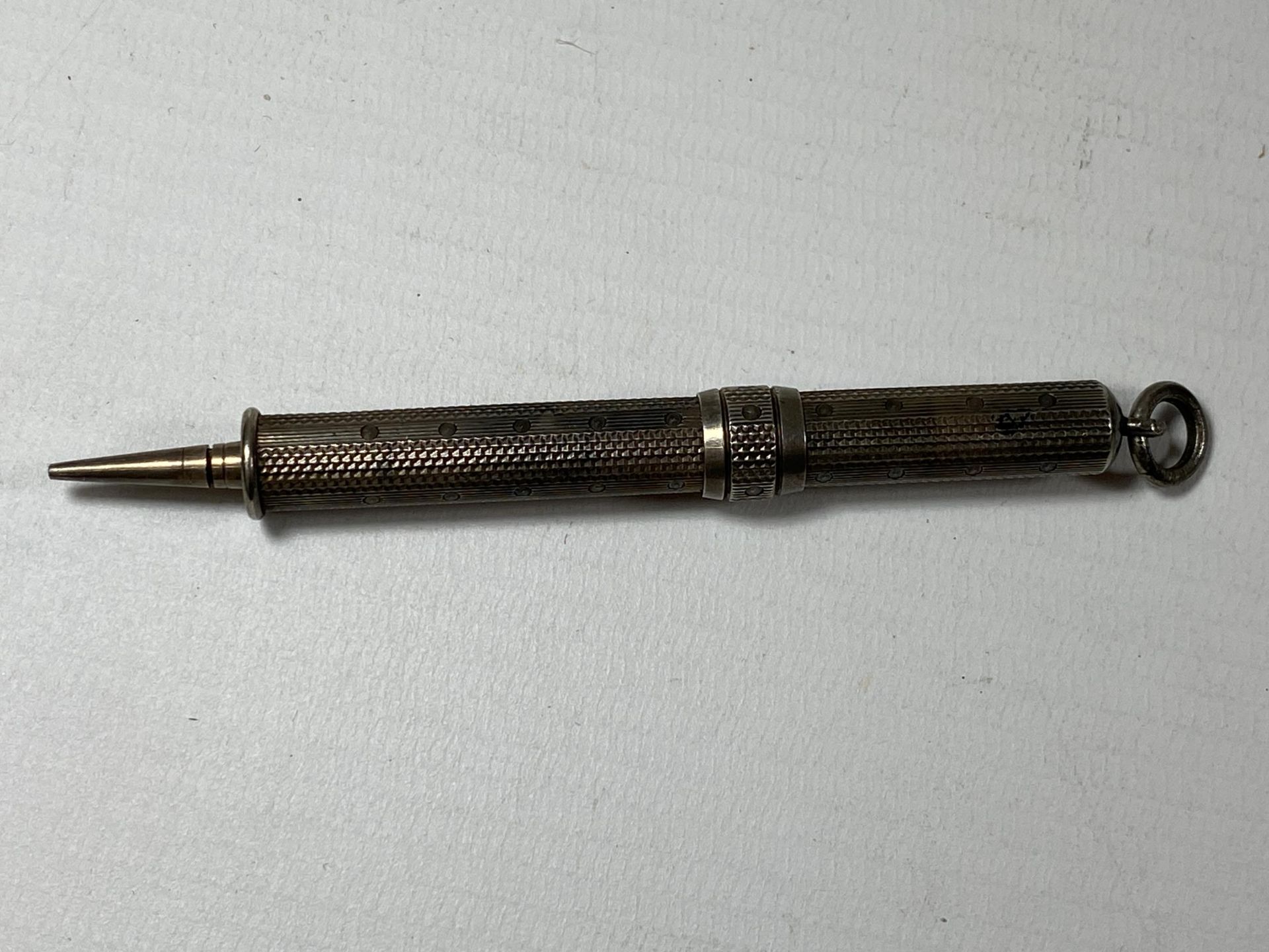 A VINTAGE HALLMARKED SILVER PROPELLING PENCIL