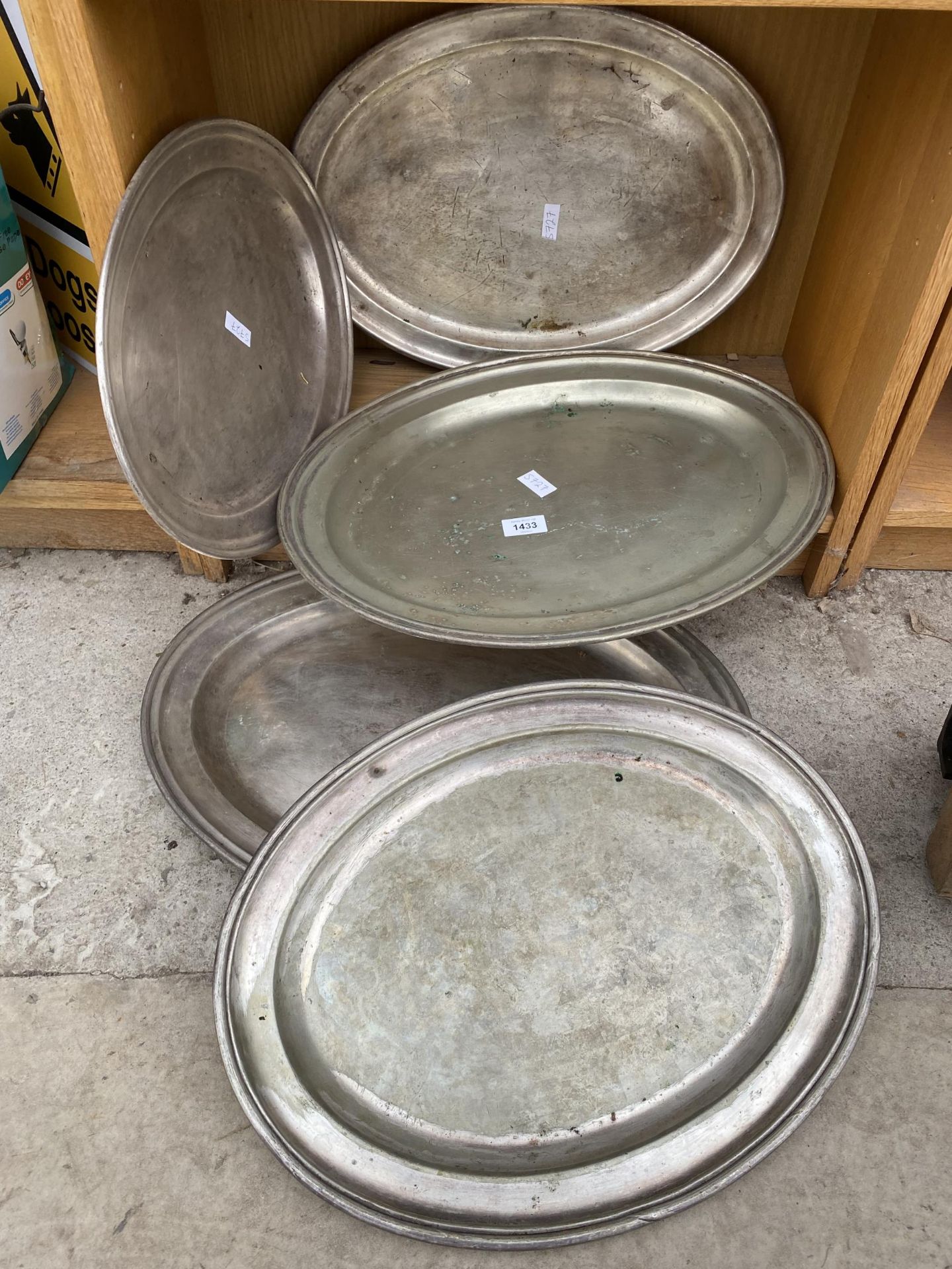 FIVE OVAL STAINLESS STEEL TRAYS