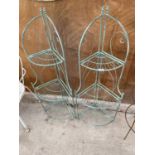 A PAIR OF GREEN PAINTED WROUGHT IRON THREE TIER CORNER WHAT-KNOTS