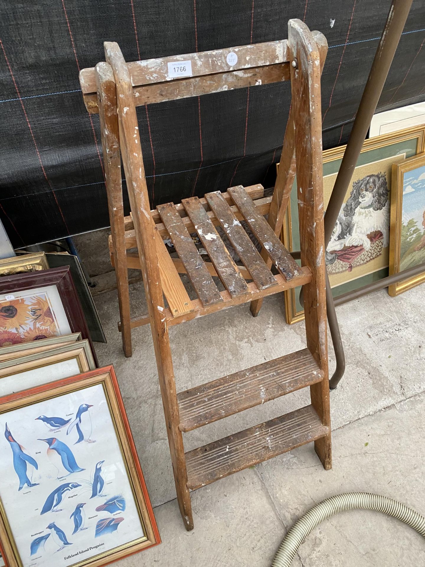 A VINTAGE WOODEN TWO RUNG STEP LADDER