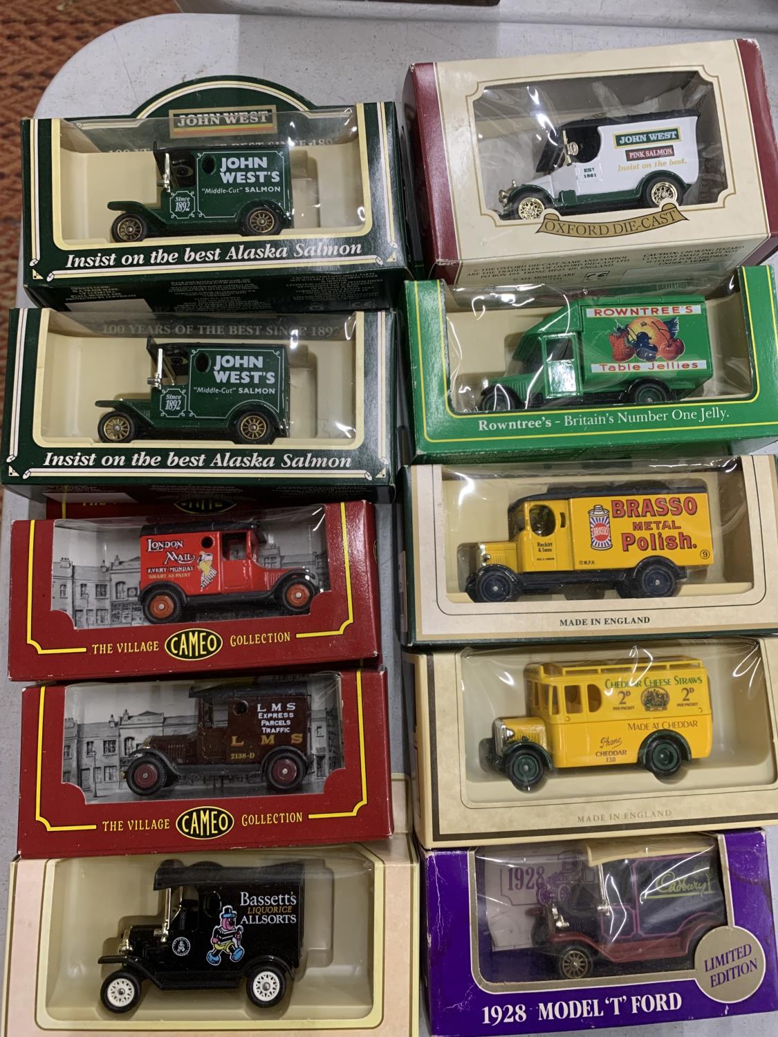 A QUANTITY OF BOXED DIE-CAST ADVERTISING VANS