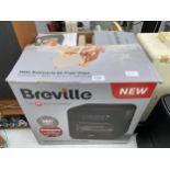 A BREVILLE HALO ROTISSERIE AIR FRYER OVEN