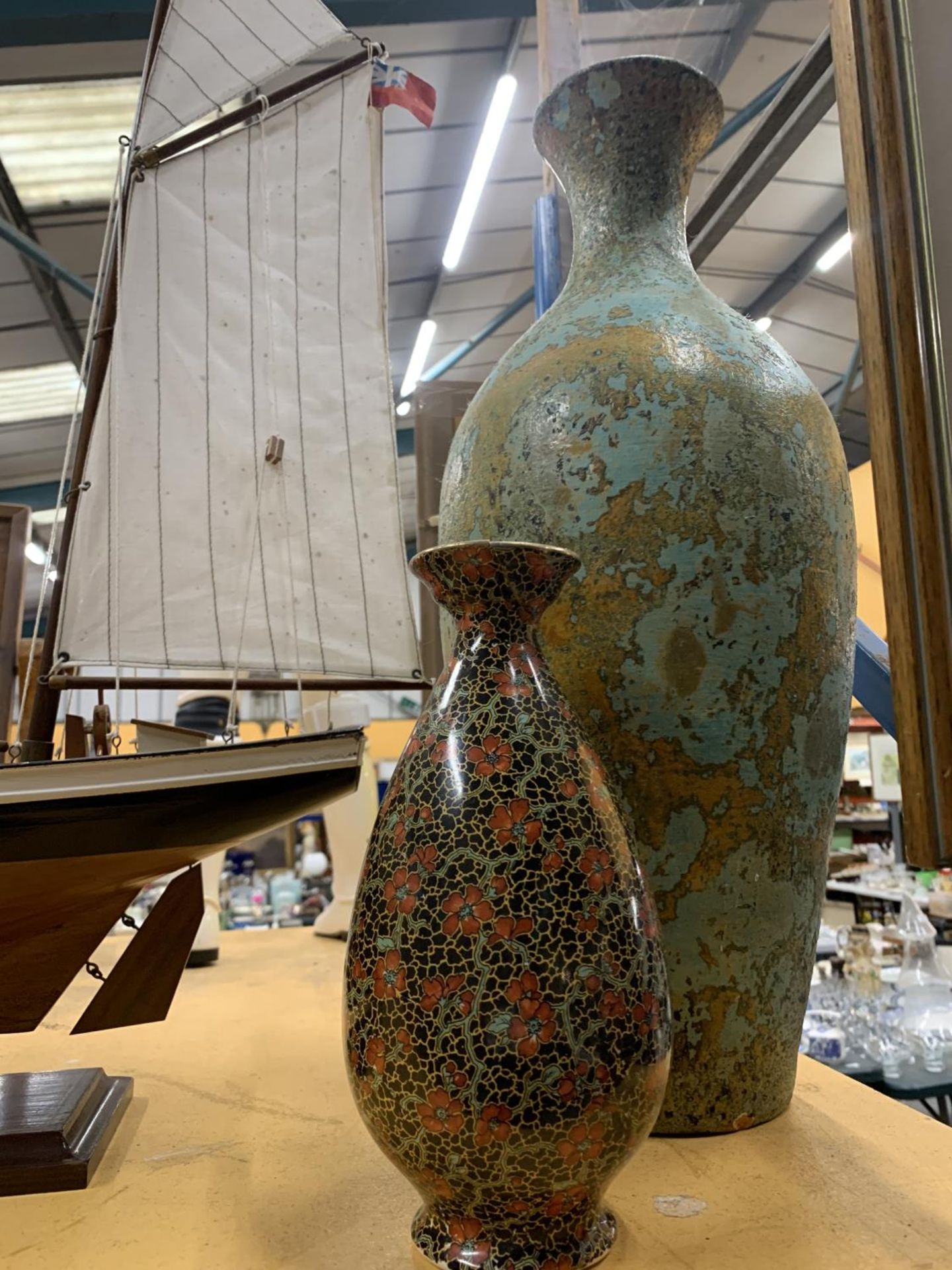 A CROWN DUCALWARE VASE WITH FLORAL PATTERN PLUS A VERY LARGE STONEWARE VASE IN A MOTTLED TURQUOISE