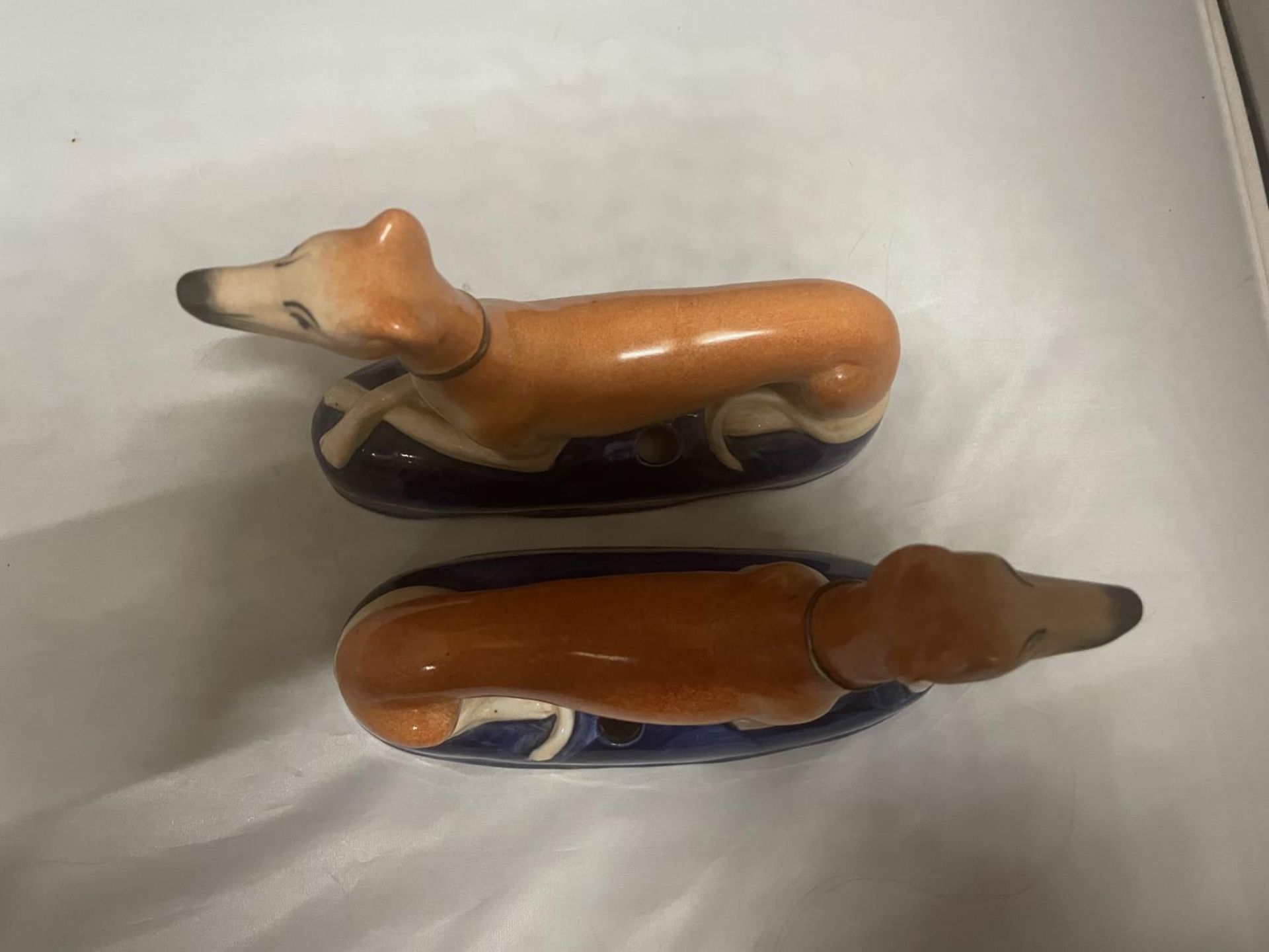 A PAIR OF ANTIQUE STAFFORDSHIRE GREYHOUND INK WELLS - Image 3 of 4