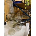 THREE VINTAGE OIL LAMPS, ONE BRASS AND TWO GLASS