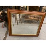 A FRAMED MIRROR