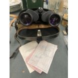 A PAIR OF VINTAGE RUSSIAN PRISMATIC BINOCULARS IN THE ORIGINAL BOX WITH ORIGINAL RECEIPT AND