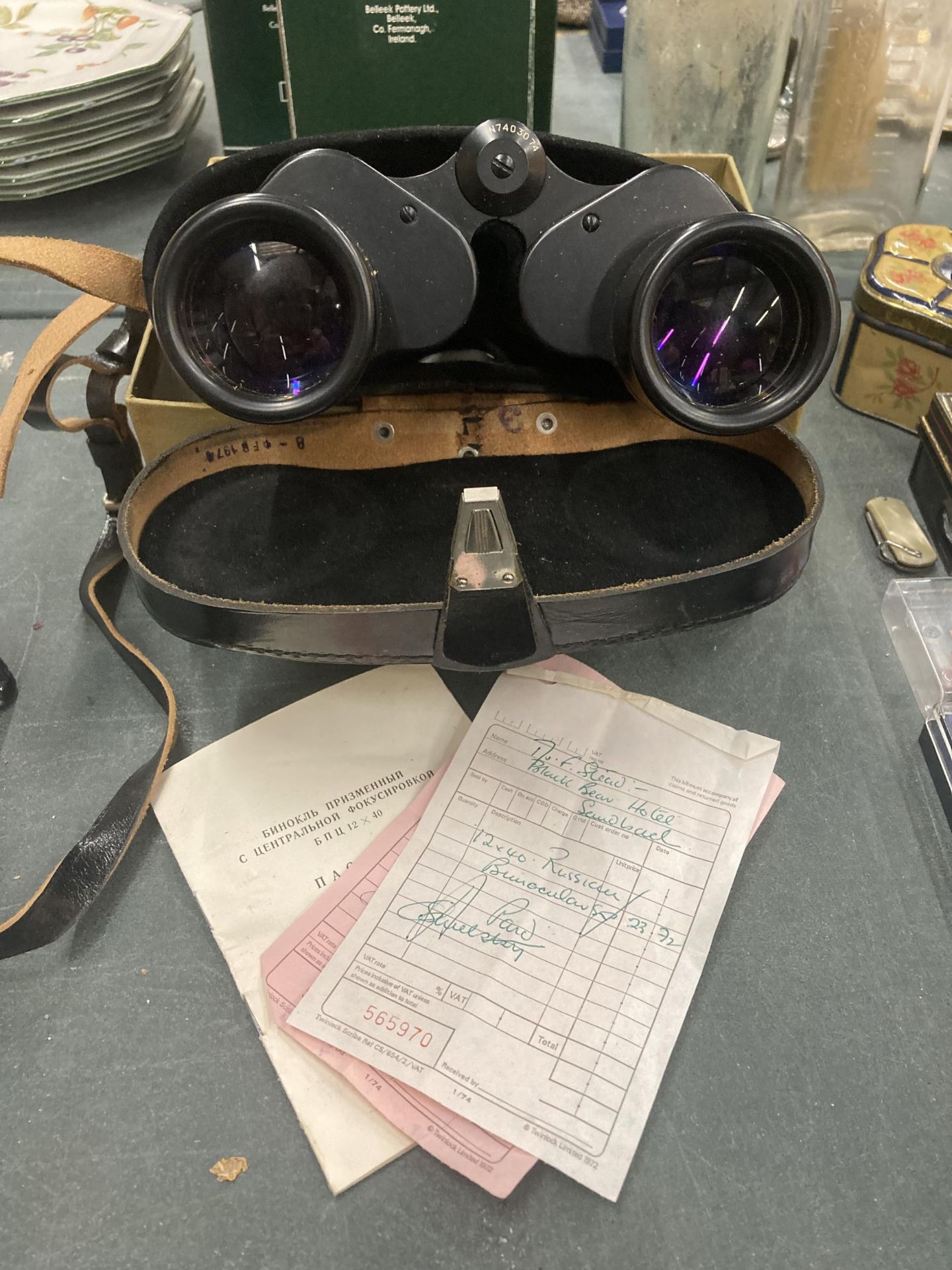 A PAIR OF VINTAGE RUSSIAN PRISMATIC BINOCULARS IN THE ORIGINAL BOX WITH ORIGINAL RECEIPT AND