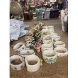 ALARGE QUANTITY OF CERAMIC NAPKIN RINGS