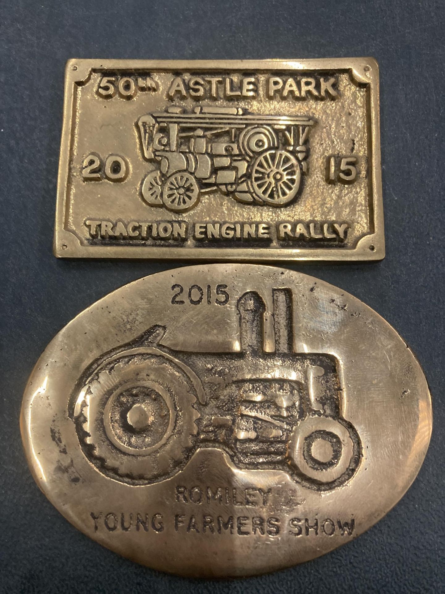 TWO SMALL BRASS PLAQUES - 50TH ASTLE PARK TRACTION ENGINE RALLY AND 2015 ROMILY YOUNG FARMERS SHOW