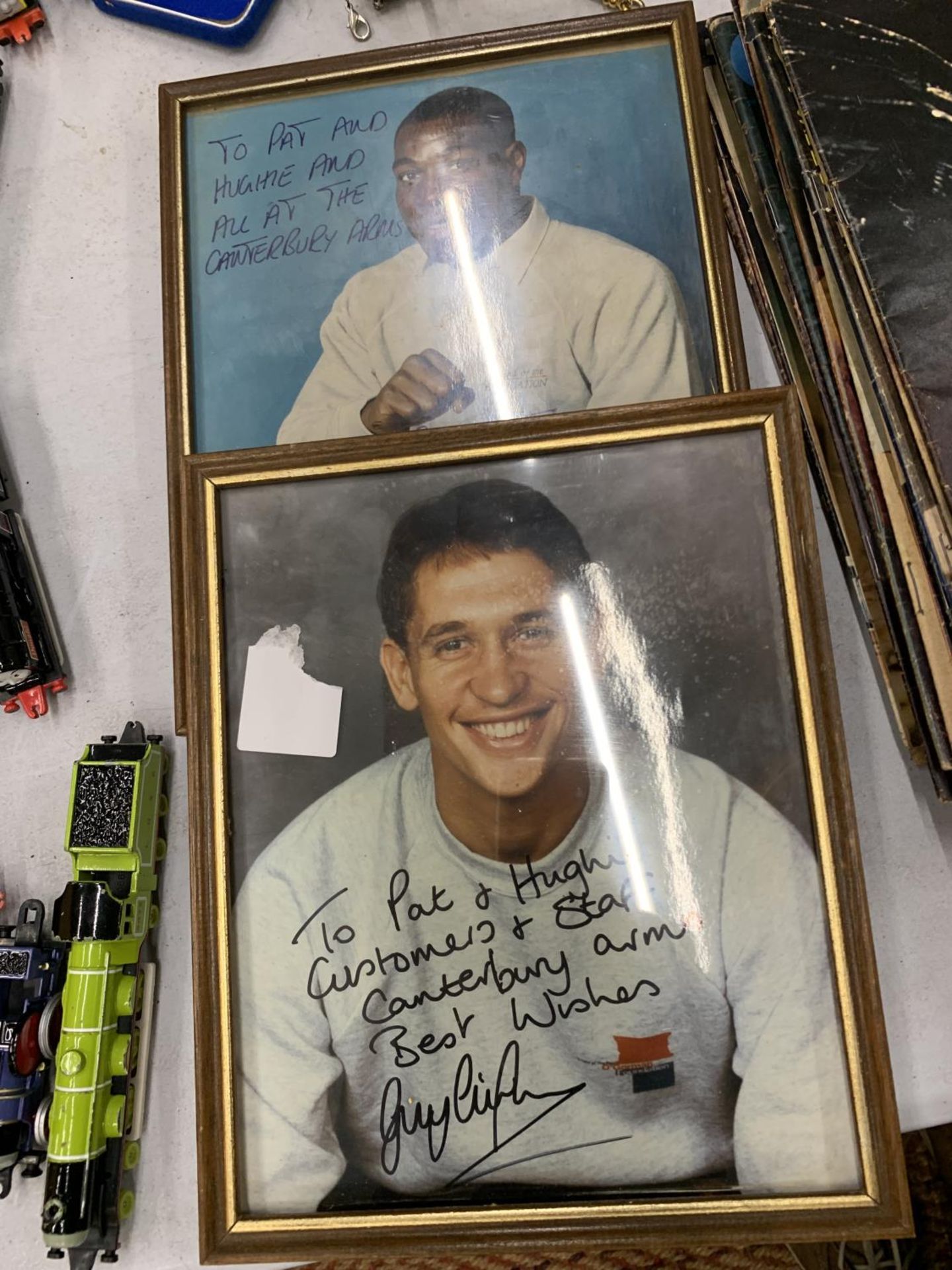 TWO FRAMED SIGNED PHOTOGRAPHS OF GARY LINEKER AND FRANK BRUNO