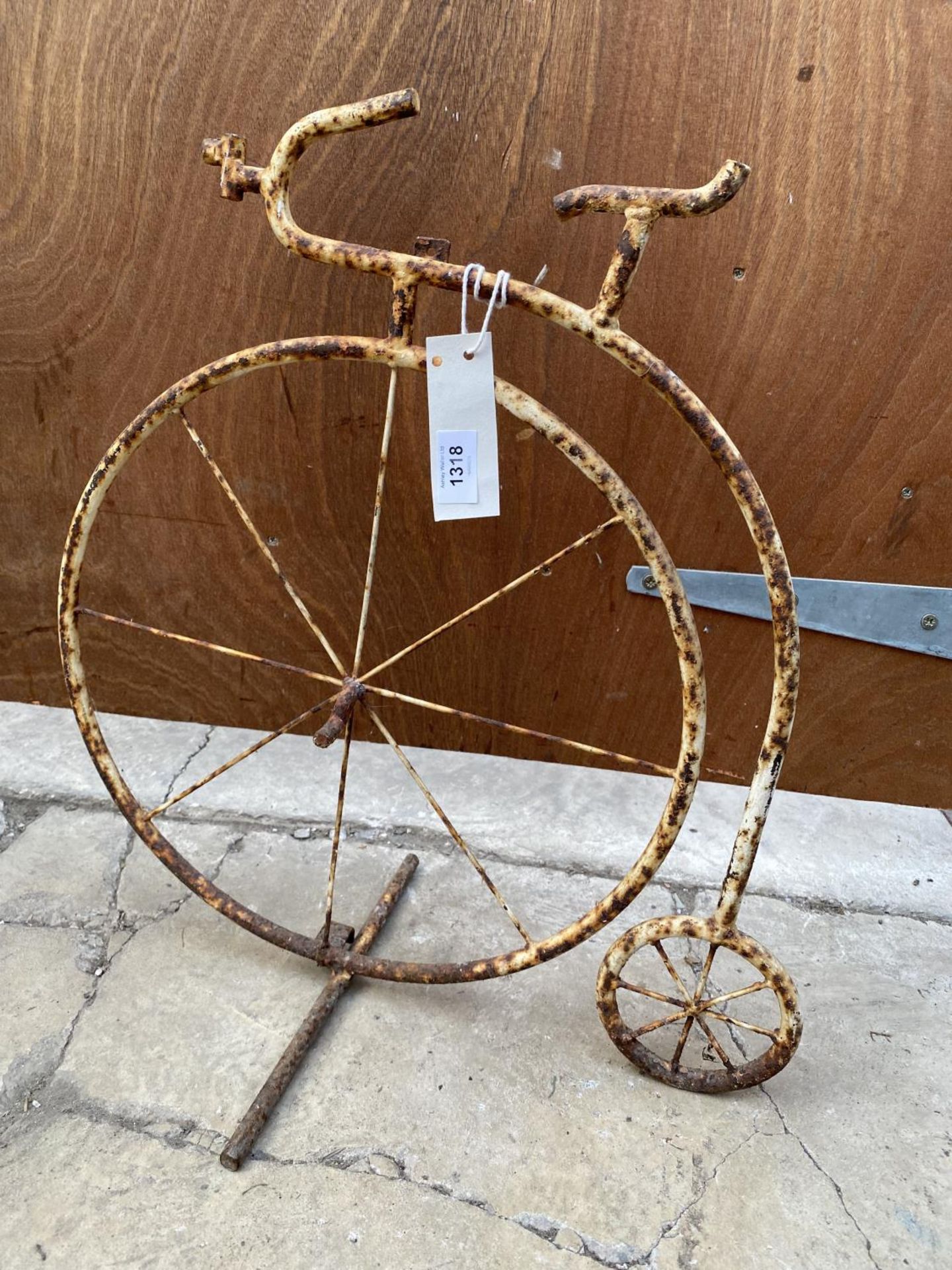 A MINIATURE METAL PENNY FARTHING