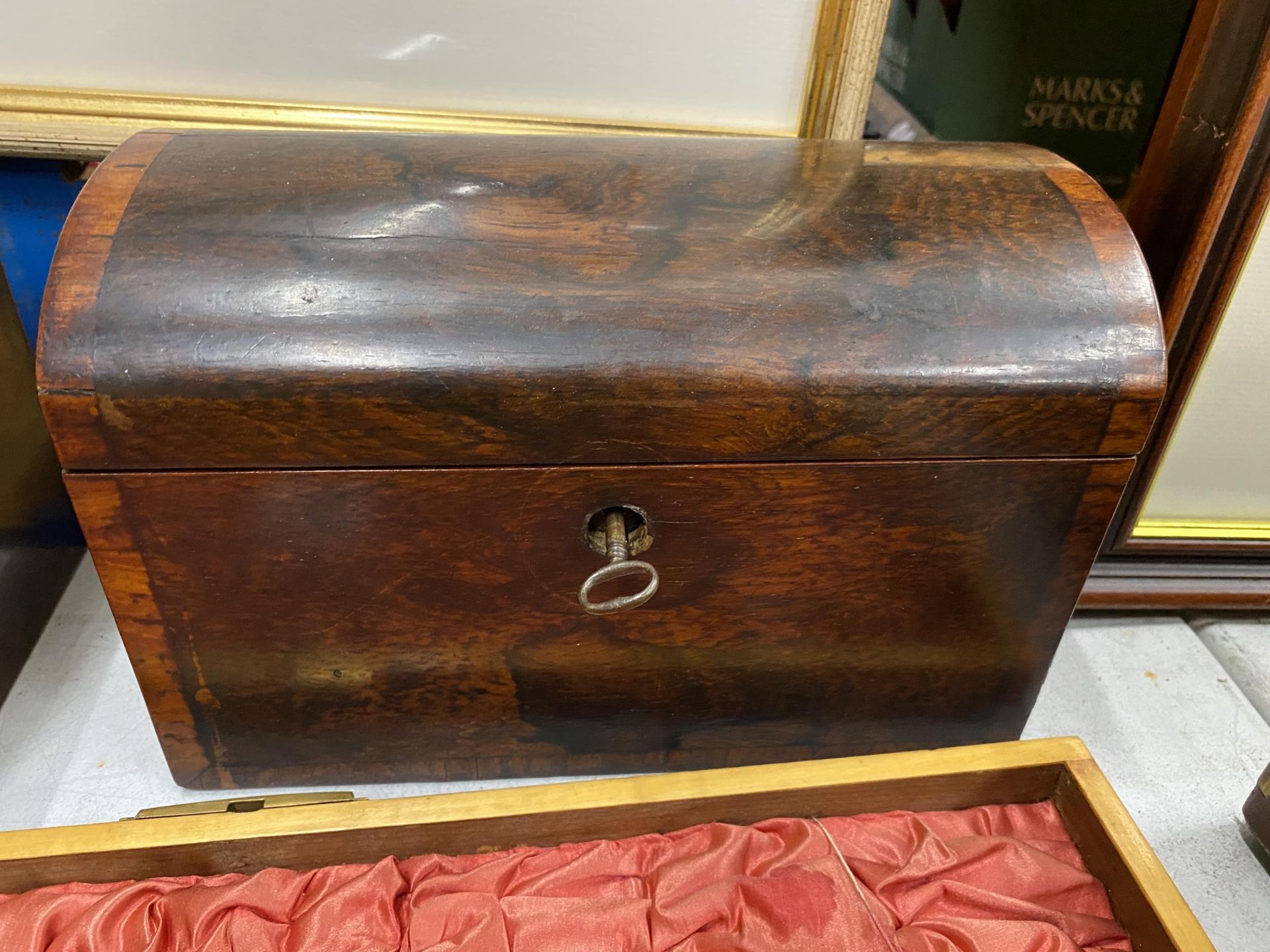 A 19TH CENTURY ROSEWOOD DOME TOPPED TEA CADDY