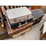 FOUR VARIOUS VINTAGE SUITCASES AND DOME TOPPED TRUNK