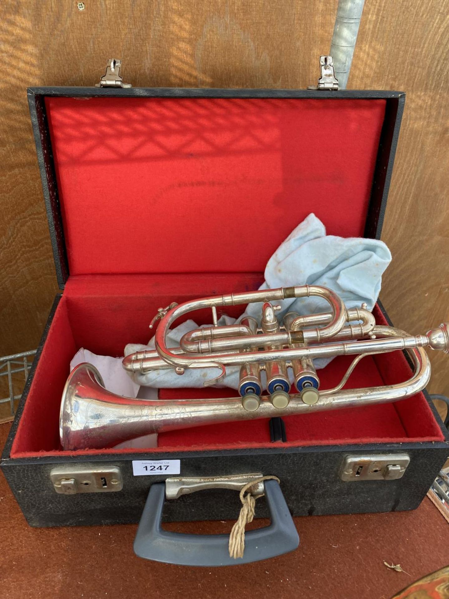 A CASED TRUMPET BEARING THE STAMP 'CORTON'