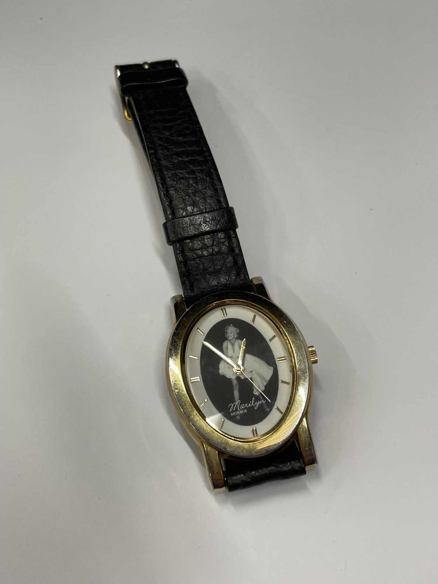 A MARILYN MUNROE WRIST WATCH SEEN WORKING BUT NO WARRANTY