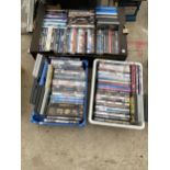 A LARGE ASSORTMENT OF DVDS ETC