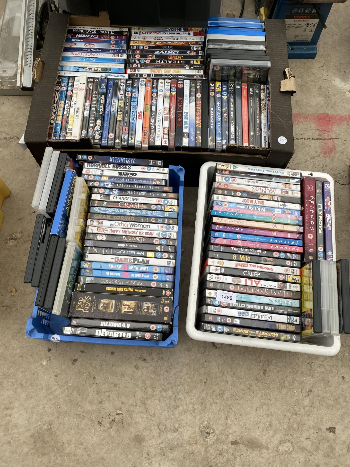 A LARGE ASSORTMENT OF DVDS ETC