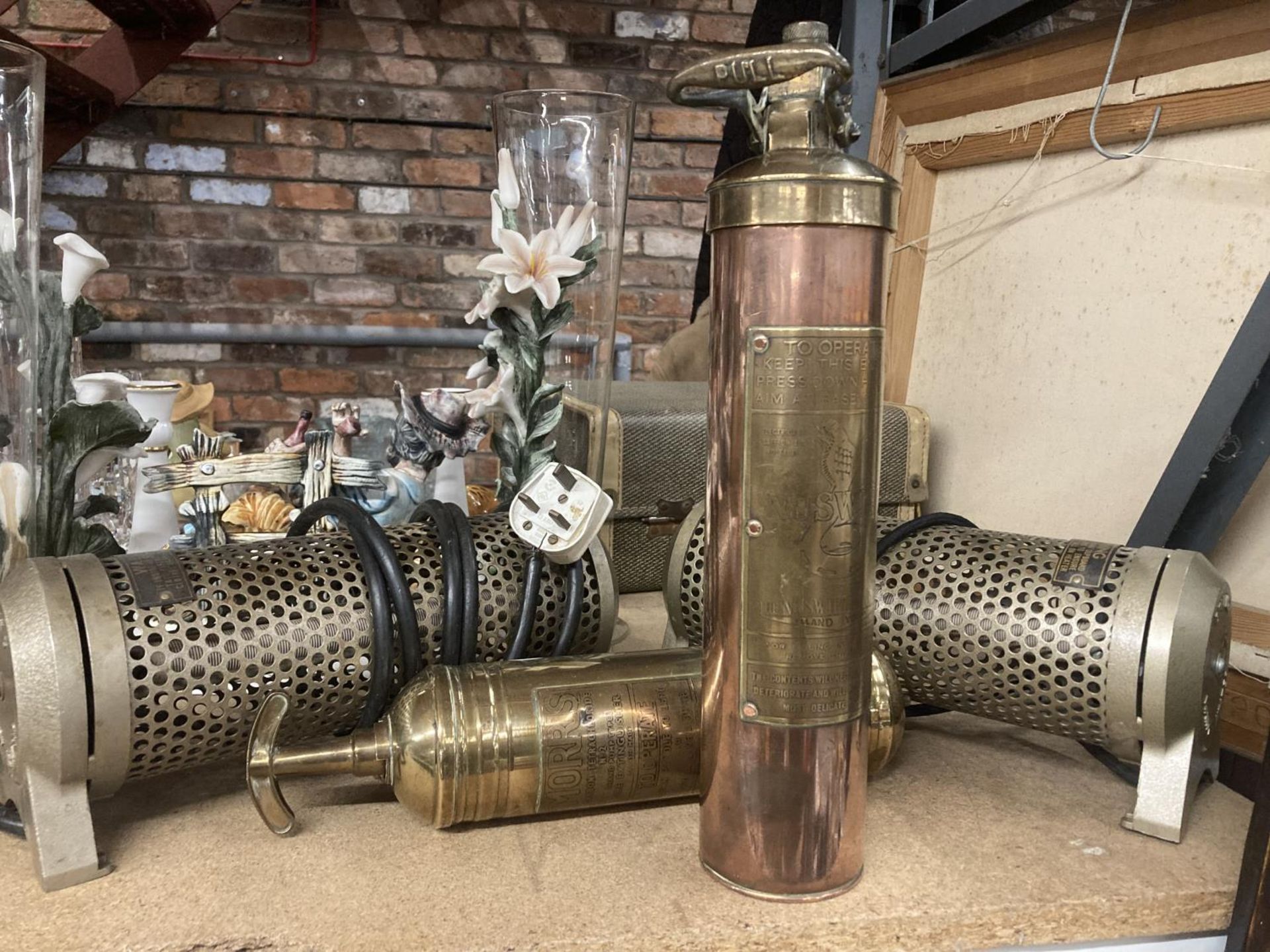 TWO VINTAGE BRASS FIRE EXTINGUISHERS AND TWO HEATERS